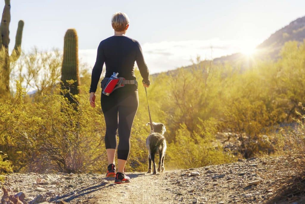 Woman Hiking With Dog in Phoenix Arizona